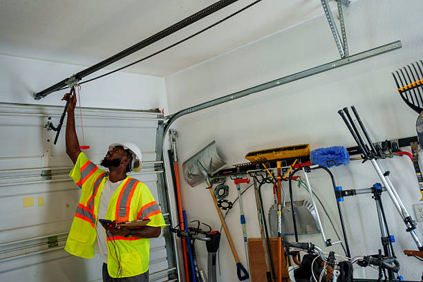 Professional Garage Door Panel Replacement technician working in Carterville, IL